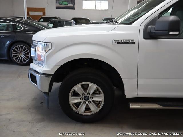 used 2018 Ford F-150 car, priced at $21,988