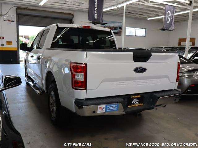 used 2018 Ford F-150 car, priced at $21,988