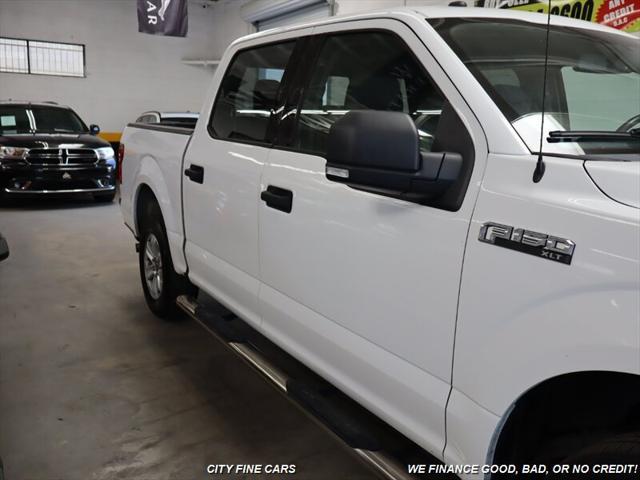 used 2018 Ford F-150 car, priced at $21,988