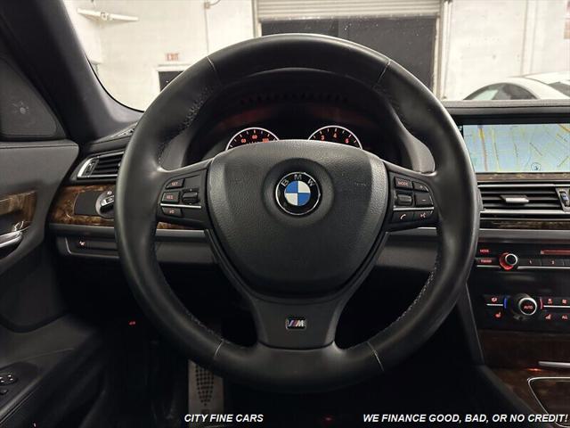 used 2013 BMW 750 car, priced at $11,500