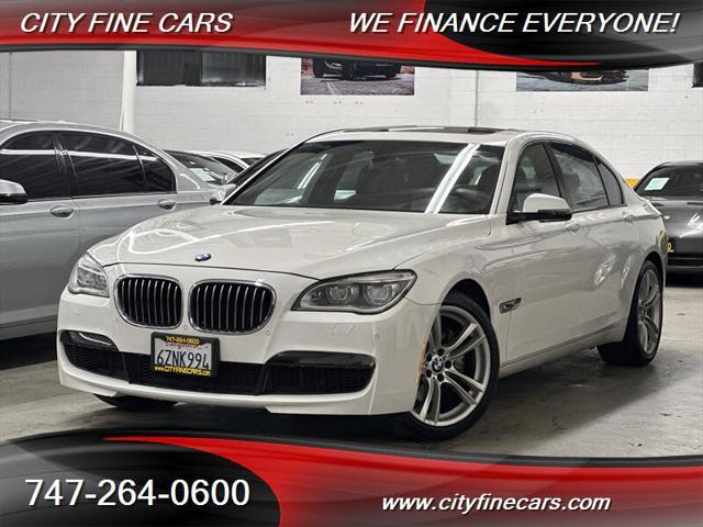 used 2013 BMW 740 car, priced at $12,488