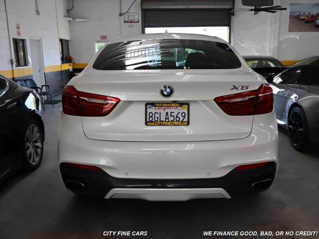 used 2019 BMW X6 car, priced at $34,988
