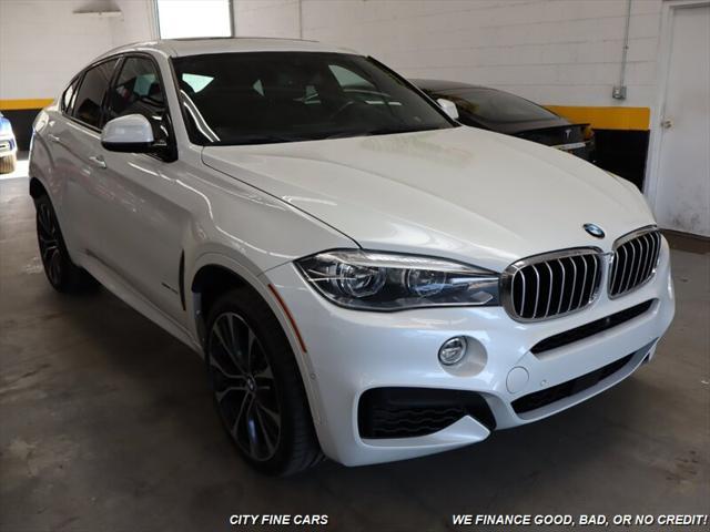 used 2019 BMW X6 car, priced at $34,988