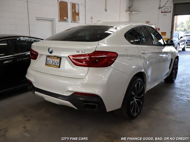 used 2019 BMW X6 car, priced at $34,988