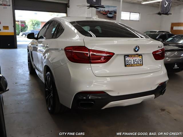 used 2019 BMW X6 car, priced at $34,988