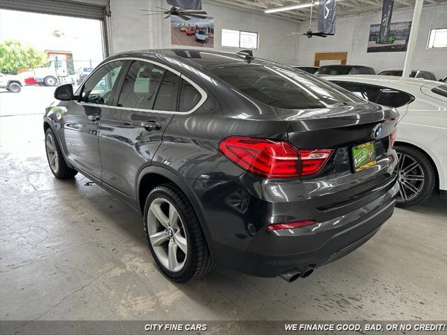 used 2016 BMW X4 car, priced at $18,488