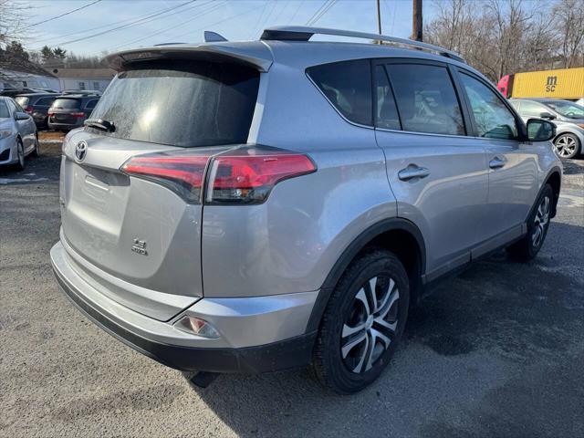 used 2016 Toyota RAV4 car, priced at $13,495