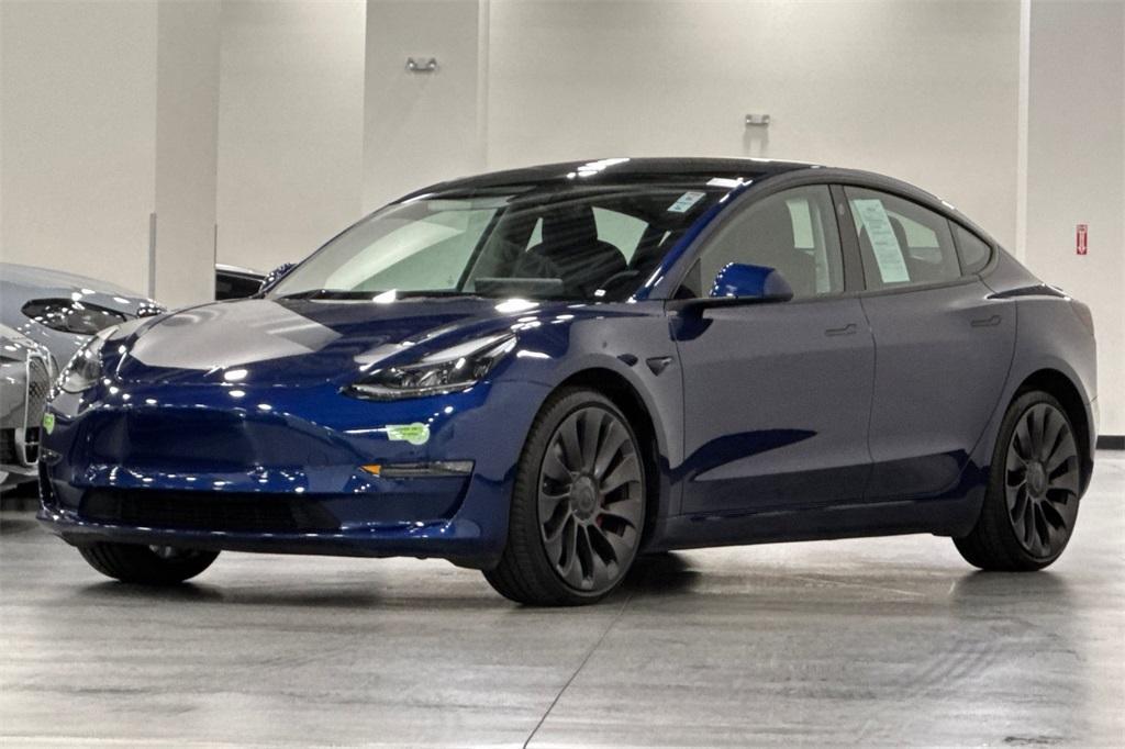 used 2023 Tesla Model 3 car, priced at $31,000