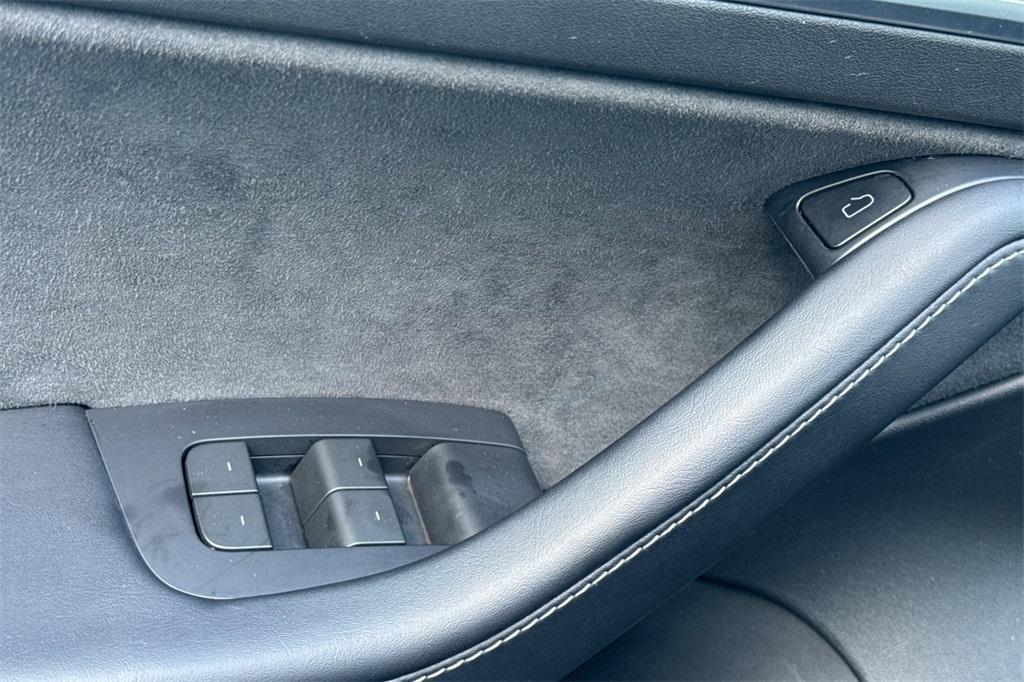 used 2023 Tesla Model 3 car, priced at $31,000