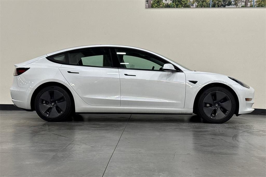 used 2022 Tesla Model 3 car, priced at $30,500