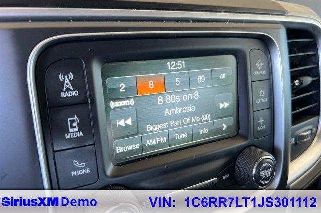 used 2018 Ram 1500 car, priced at $25,000