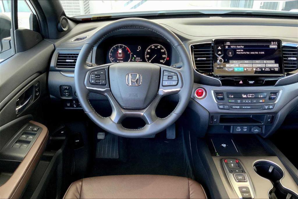used 2025 Honda Ridgeline car, priced at $42,114