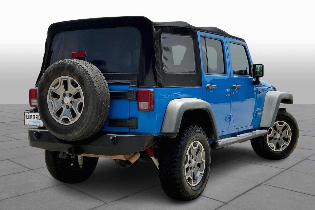 used 2011 Jeep Wrangler Unlimited car, priced at $11,837