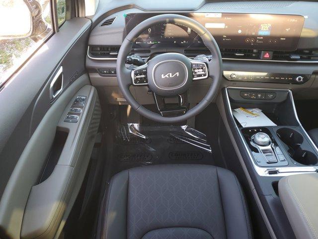 new 2025 Kia Carnival Hybrid car, priced at $47,100