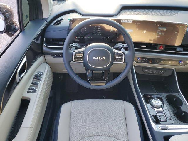 new 2025 Kia Carnival Hybrid car, priced at $48,100