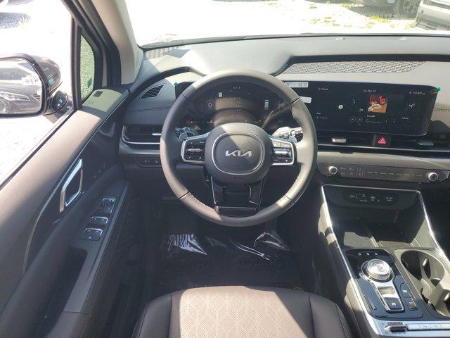 new 2025 Kia Carnival Hybrid car, priced at $48,100