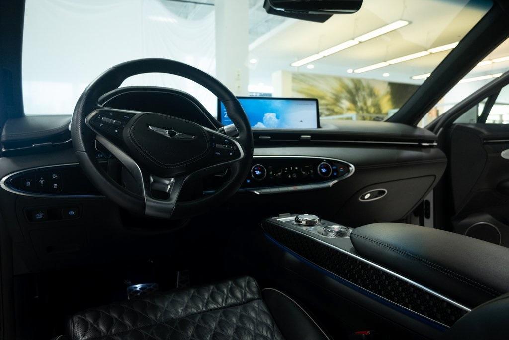 used 2023 Genesis GV70 car, priced at $37,470