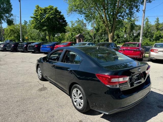 used 2023 Subaru Impreza car, priced at $16,995