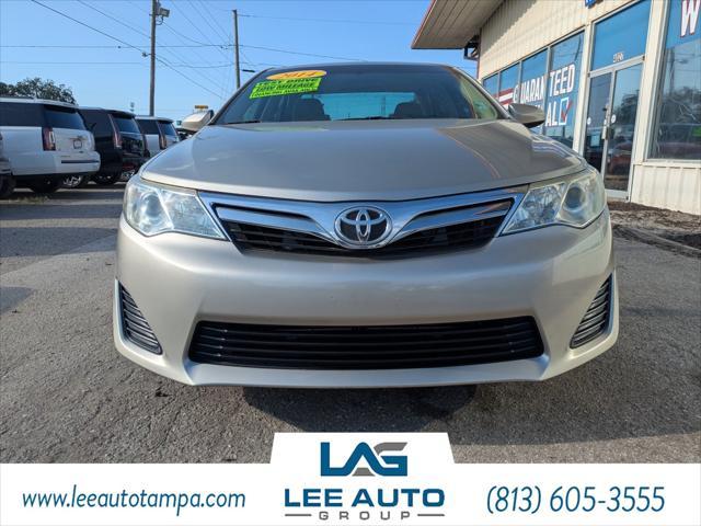 used 2014 Toyota Camry car, priced at $14,000