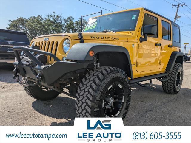 used 2015 Jeep Wrangler Unlimited car, priced at $21,560