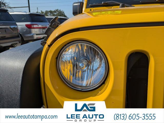 used 2015 Jeep Wrangler Unlimited car, priced at $21,560