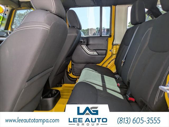 used 2015 Jeep Wrangler Unlimited car, priced at $21,560