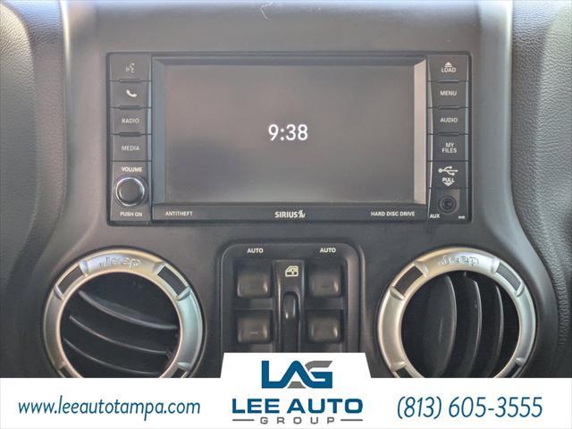 used 2015 Jeep Wrangler Unlimited car, priced at $21,560