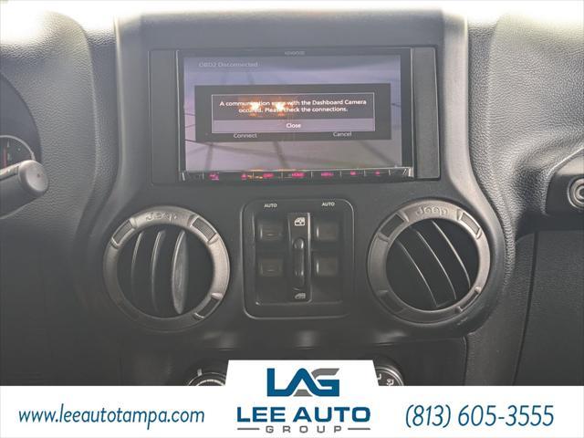 used 2015 Jeep Wrangler Unlimited car, priced at $17,640