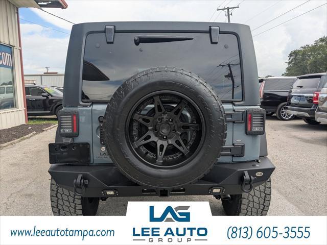 used 2015 Jeep Wrangler Unlimited car, priced at $17,640