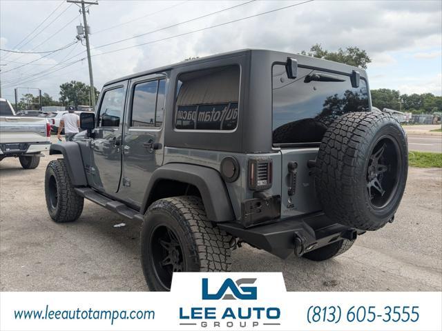 used 2015 Jeep Wrangler Unlimited car, priced at $17,640