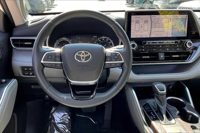 used 2021 Toyota Highlander Hybrid car, priced at $39,499