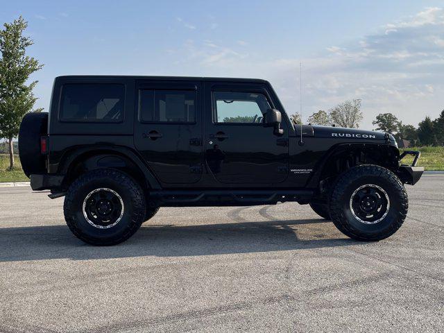 used 2014 Jeep Wrangler Unlimited car, priced at $21,500