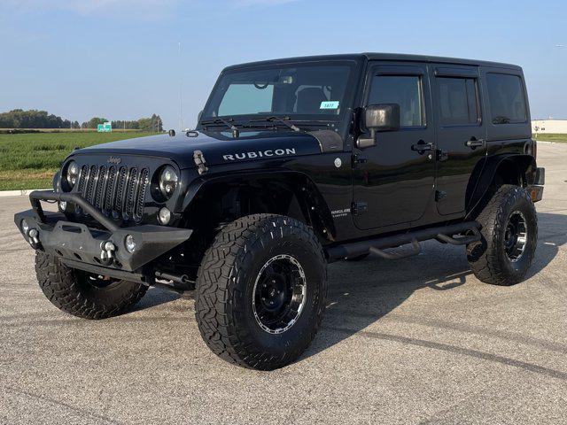 used 2014 Jeep Wrangler Unlimited car, priced at $21,500