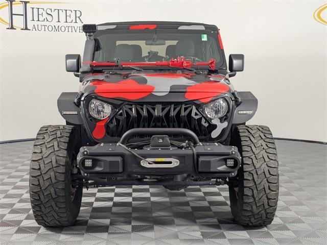 used 2021 Jeep Wrangler car, priced at $30,483