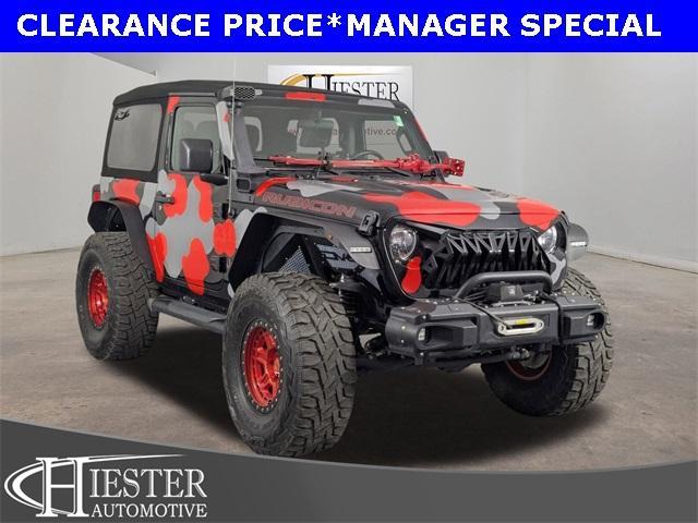 used 2021 Jeep Wrangler car, priced at $30,483