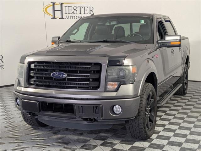 used 2014 Ford F-150 car, priced at $19,811