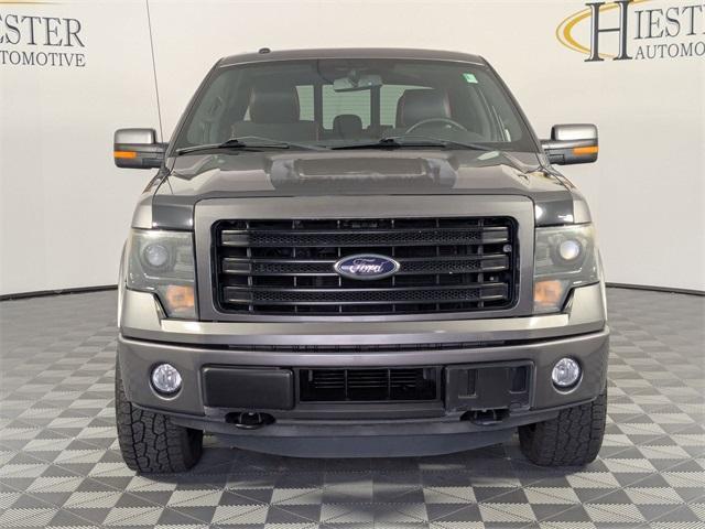 used 2014 Ford F-150 car, priced at $19,811