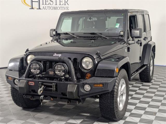 used 2013 Jeep Wrangler Unlimited car, priced at $21,495