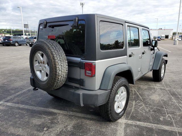 used 2014 Jeep Wrangler Unlimited car, priced at $16,455