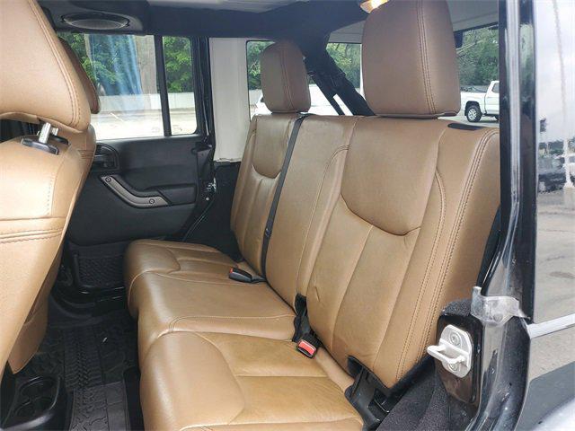 used 2013 Jeep Wrangler Unlimited car, priced at $15,897