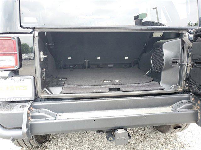 used 2013 Jeep Wrangler Unlimited car, priced at $15,897