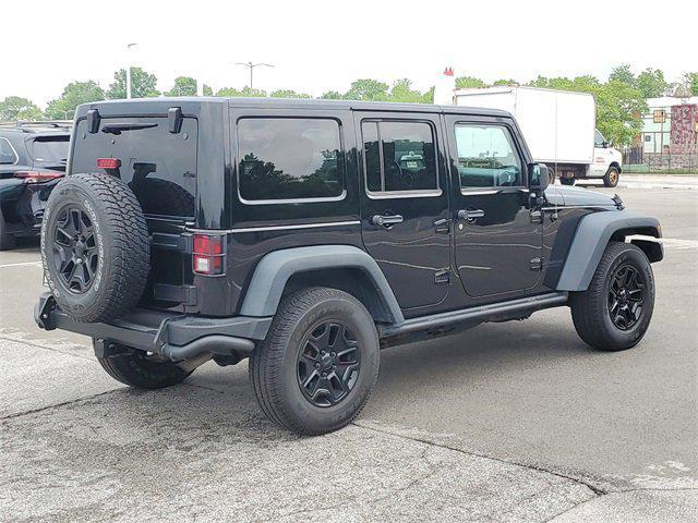 used 2013 Jeep Wrangler Unlimited car, priced at $15,897