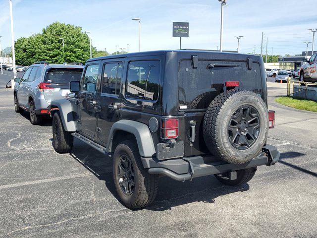 used 2013 Jeep Wrangler Unlimited car, priced at $16,791