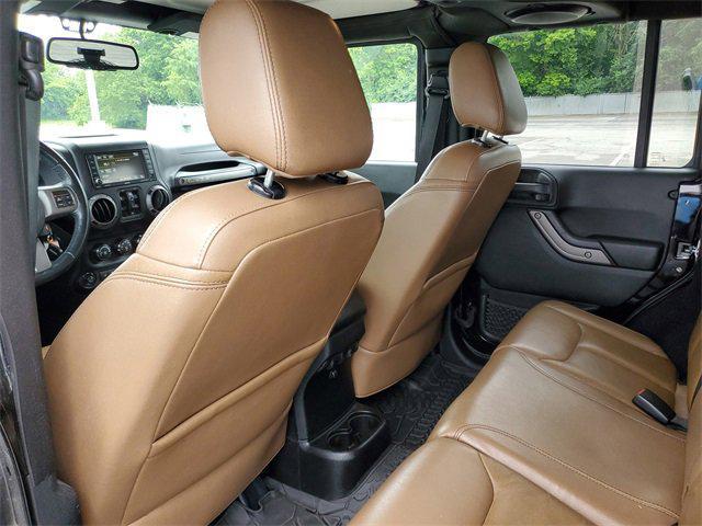 used 2013 Jeep Wrangler Unlimited car, priced at $15,897