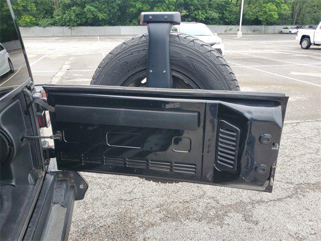used 2013 Jeep Wrangler Unlimited car, priced at $15,897