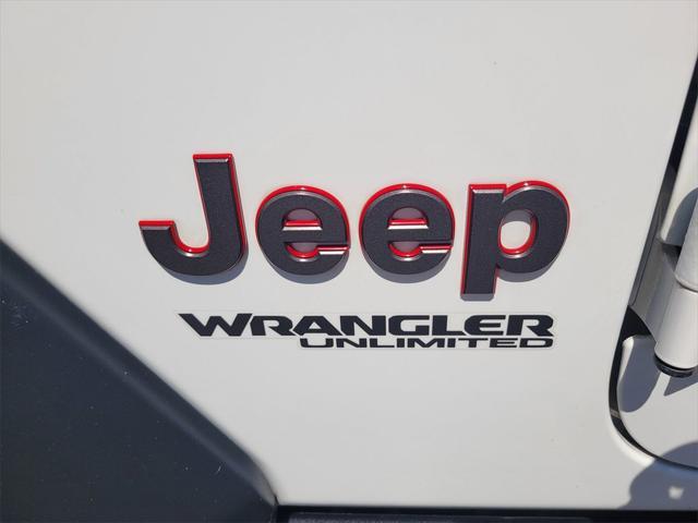 used 2019 Jeep Wrangler Unlimited car, priced at $30,596