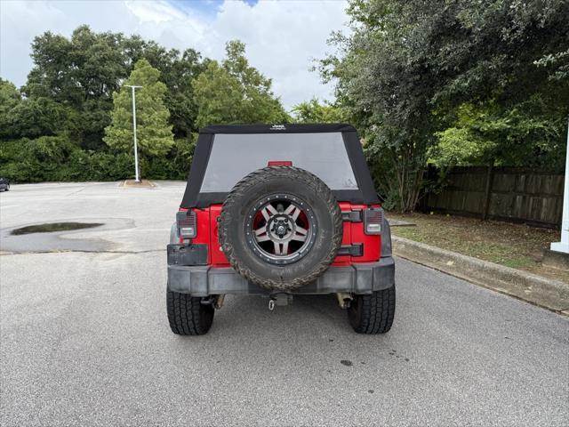 used 2015 Jeep Wrangler Unlimited car, priced at $19,409