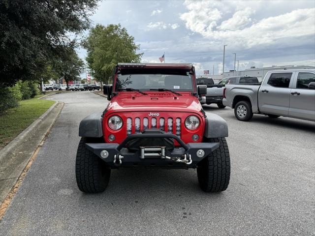 used 2015 Jeep Wrangler Unlimited car, priced at $19,409