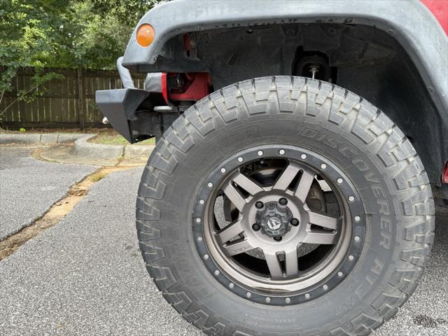used 2015 Jeep Wrangler Unlimited car, priced at $19,409