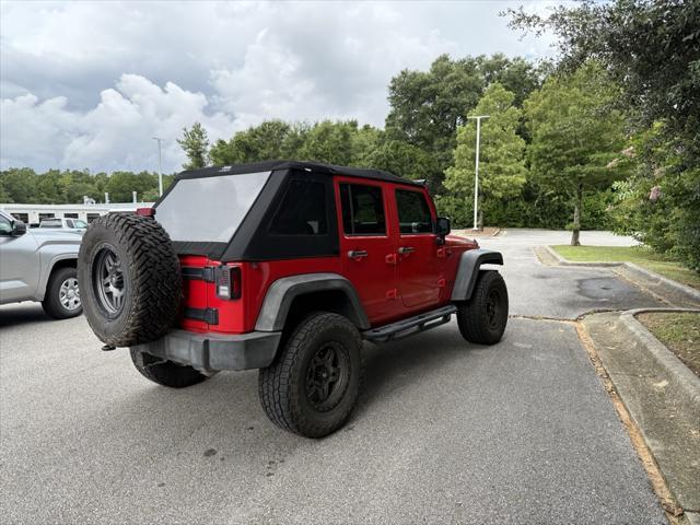 used 2015 Jeep Wrangler Unlimited car, priced at $19,409